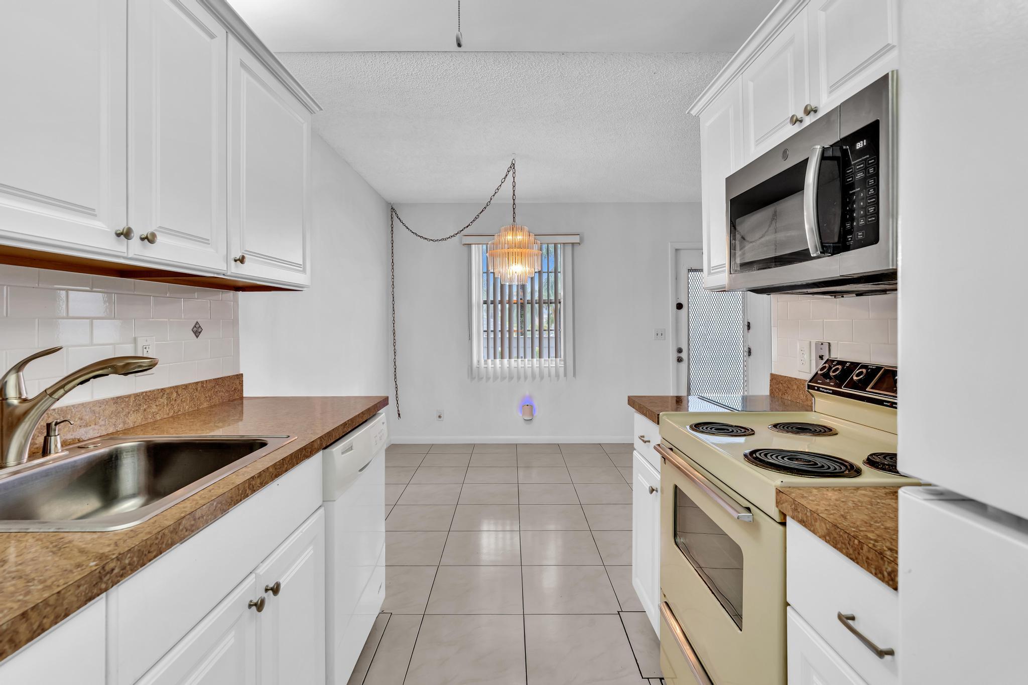 EXETER AT CENTURY VILLAGE CONDO - Residential