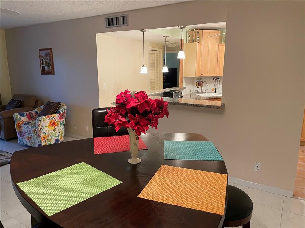 Photo of 4330 Hillcrest Dr #302, Hollywood, FL 33021 (MLS # F10292267)