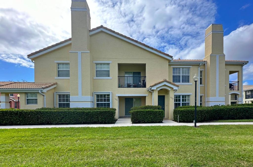 Photo of 130 SW Peacock Boulevard #104, Port Saint Lucie, FL 34986 (MLS # R10984525)