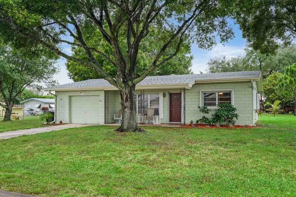 Photo of 102 E Arbor Avenue, Port Saint Lucie, FL 34952 (MLS # R10751358)