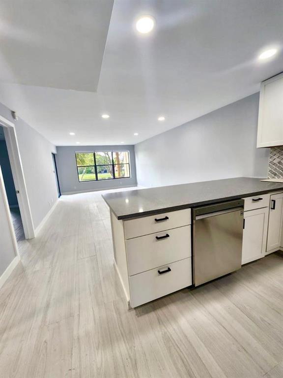 Photo of 2322 S CYPRESS BEND Drive #210, Pompano Beach, FL 33069 (MLS # B26076778)