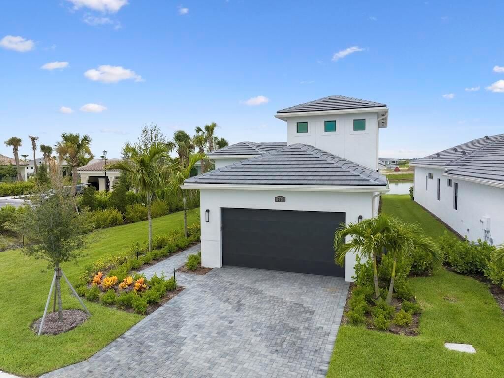 Photo of 12442 SW Lunata Way, Port St Lucie, FL 34987 (MLS # R11104000)