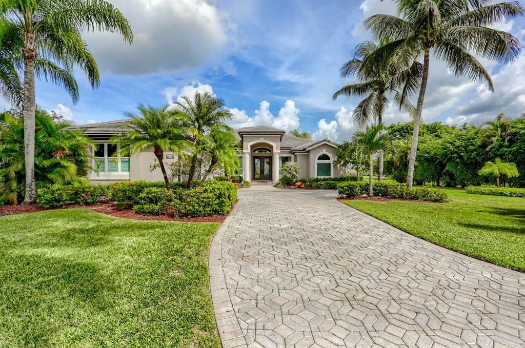 Photo of 11950 Torreyanna Circle, Palm Beach Gardens, FL 33412 (MLS # R10752745)