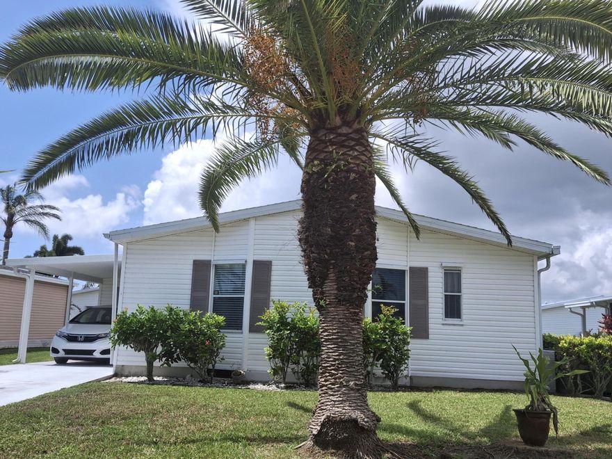 One of the best deals in Savanna Club for the price! 2/2 with a lanai on a quiet street. Roof 2024 Primary bedroom can fit a king sized bed. An outdoor patio on the back of the home to enjoy grilling outdoors. Open living and formal dining area with a dinette area off the kitchen. This home has fabulous tropical landscaping with all the palm trees. Motivated Seller. Come and view this house and make it your home. HOA includes cable, internet, trash, sewer and access to common areas. Land Leased property. Savanna club has 3 clubhouses, 3 pools, 3 exercise rooms with modern equipment, a theater and an on-site restaurant. Pickleball, tennis, and more. There are also a great many clubs to join as well. Be as busy as you want to be. Within minutes to physicians, hospital and beaches.