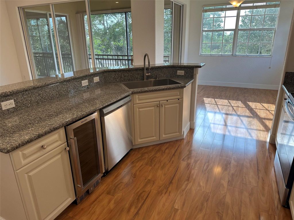 Photo of 7953 NW 128th Lane #12-F, Parkland, FL 33076 (MLS # F10494608)
