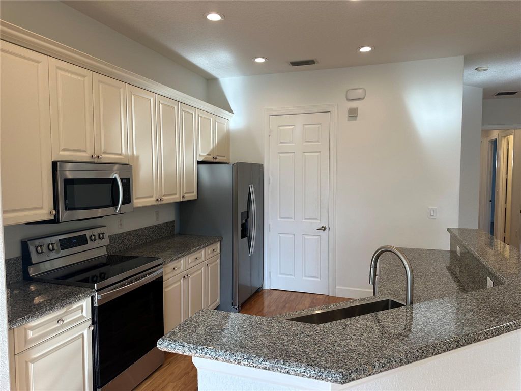 Photo of 7953 NW 128th Lane #12-F, Parkland, FL 33076 (MLS # F10494608)