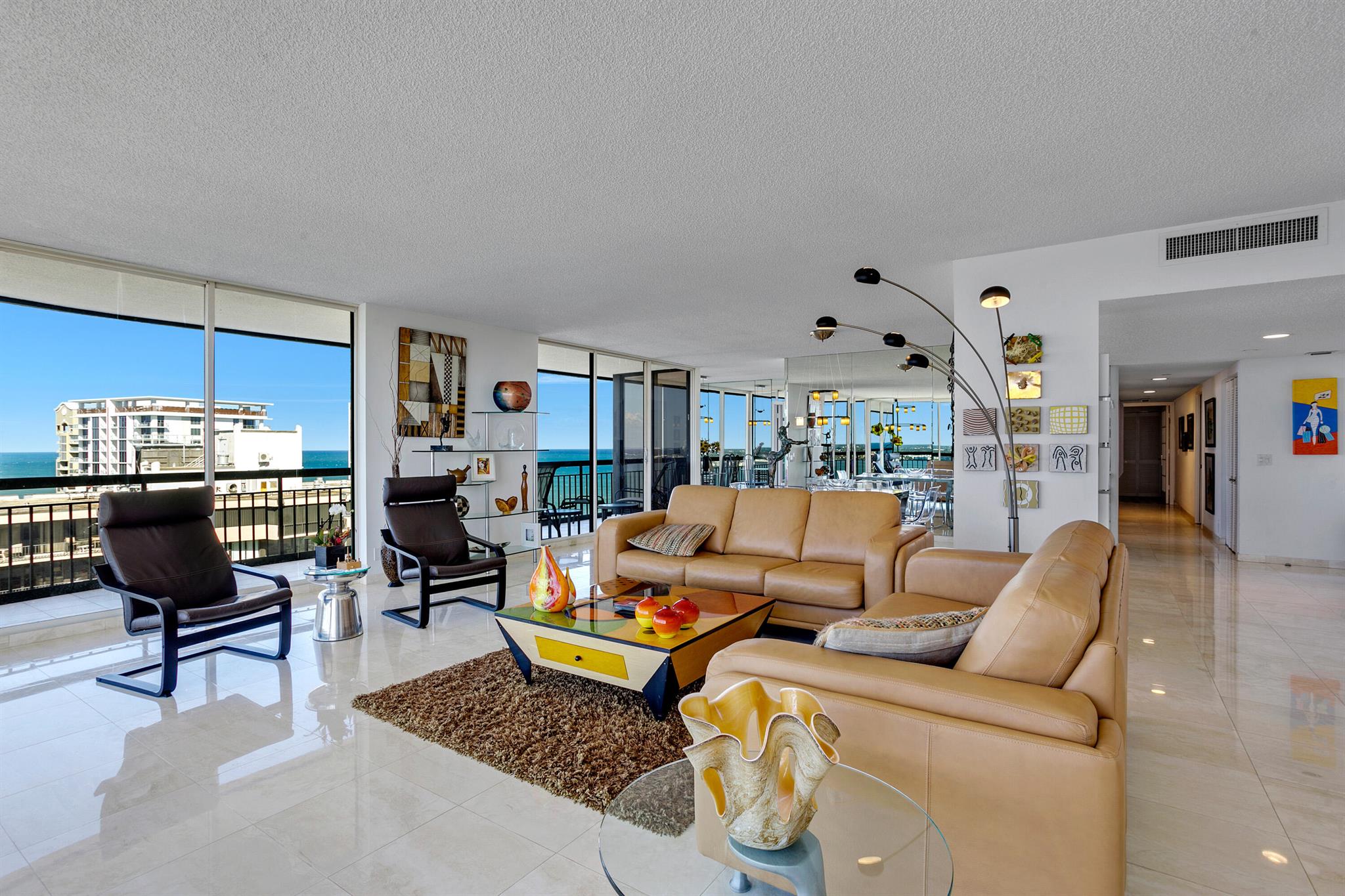 STUNNING OCEAN AND INTRACOASTAL VIEWS OFFERED FROM EVERY ROOM.....THIS 3000 SQ FT PROPERTY OFFERS 2 BEDROOM SUITES ALONG WITH DEN/FAMILY ROOM ADJACENT TO THE TASTEFULLY RENOVATED KITCHEN. CAN BE CONVERTED TO 3RD BEDROOM.MARTINIQUE 2 OFFERS A PRIVATE POOLSIDE RESTAURANT, STATE OF THE ART GYMS, 24 HOUR CONCIERGE SERVICE ,MANNED GATE,2 POOLS,HOT TUB , PRIVATE BEACH ACCESS, TENNIS COURTS, AND SO MUCH MORE....AND 2 OF THE MOST COVETED ASSIGNED PARKING SPACES IN THE BUILDING.THE POOL DECK IS UNDERGOING A TOTAL RENOVATION WHICH IS SET FOR COMPLETION IN 2025.