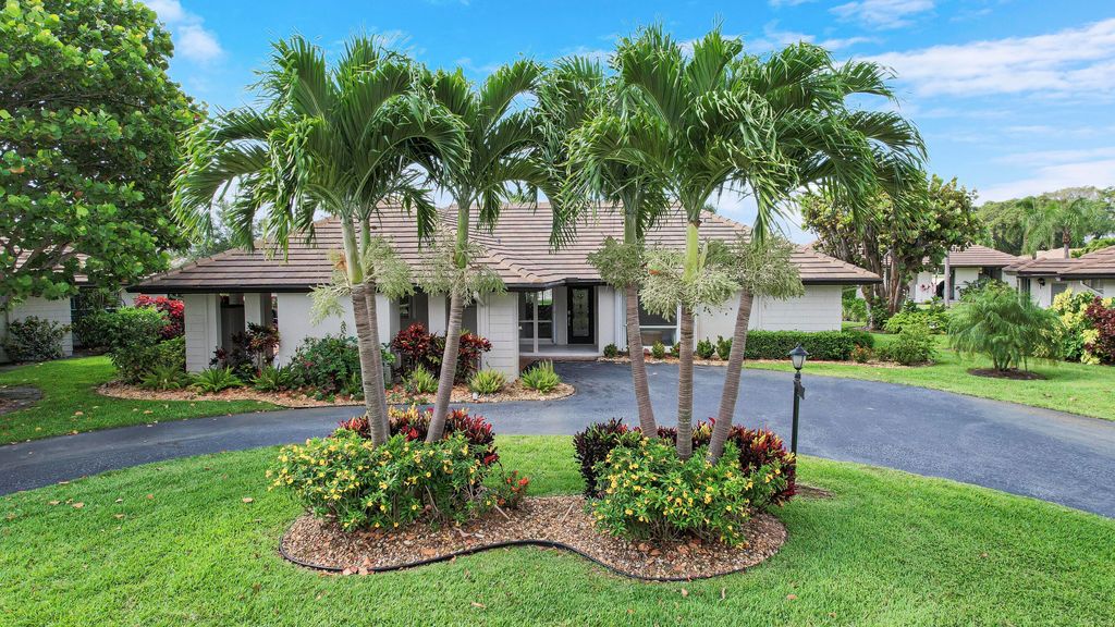 Photo of 125 Clubhouse Boulevard, Atlantis, FL 33462 (MLS # R10988226)