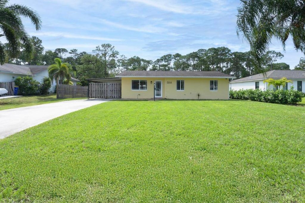 Photo of 6144 SE Orange Blossom Trail, Hobe Sound, FL 33455 (MLS # R11030739)