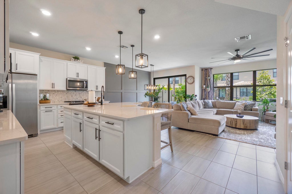 Photo of 8245 Cinch Way Way, Lake Worth Beach, FL 33467 (MLS # R10799338)