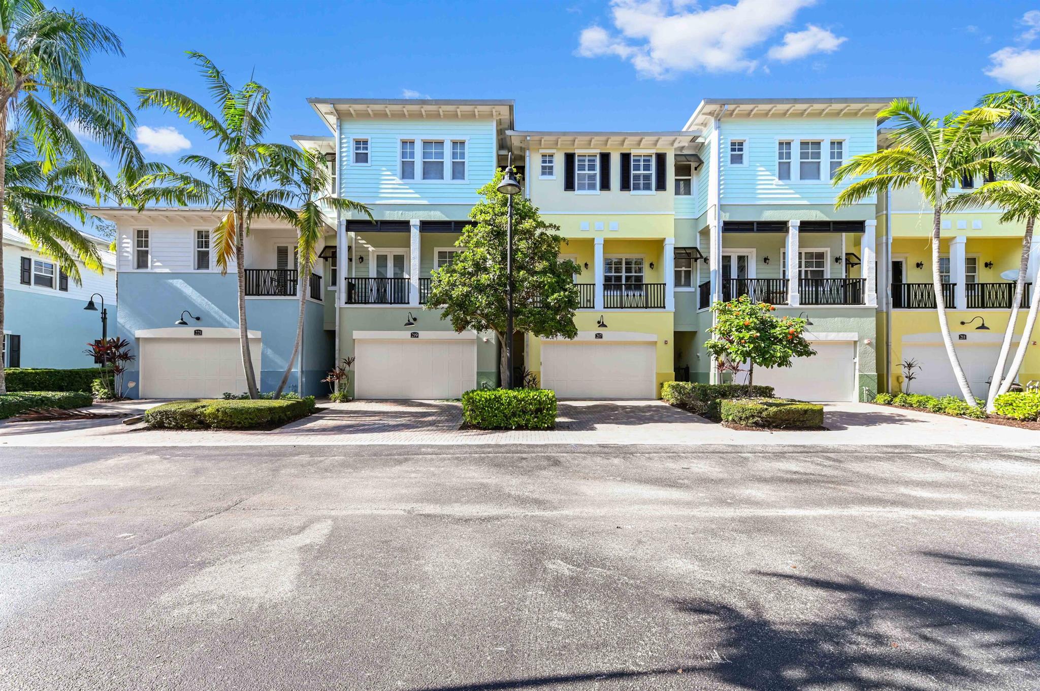 Prepare to be captivated by this spacious Key West style townhome, offering an exceptional opportunity in East Delray Beach. Boasting 4 bedrooms, 3.5 baths and a 2-car garage, this residence is adorned with all the design you've been dreaming of, exuding sophistication and comfort. This property has a living room, bedroom & full bath on the first floor which would be a great used as an in-law suite. Step inside to discover elegant wood floors that flow seamlessly throughout, complemented by gleaming granite countertops in both the gourmet kitchen and all bathrooms. The chef's kitchen features sleek stainless steel appliances, while soaring 10-11 foot ceilings create an expansive and airy ambiance.