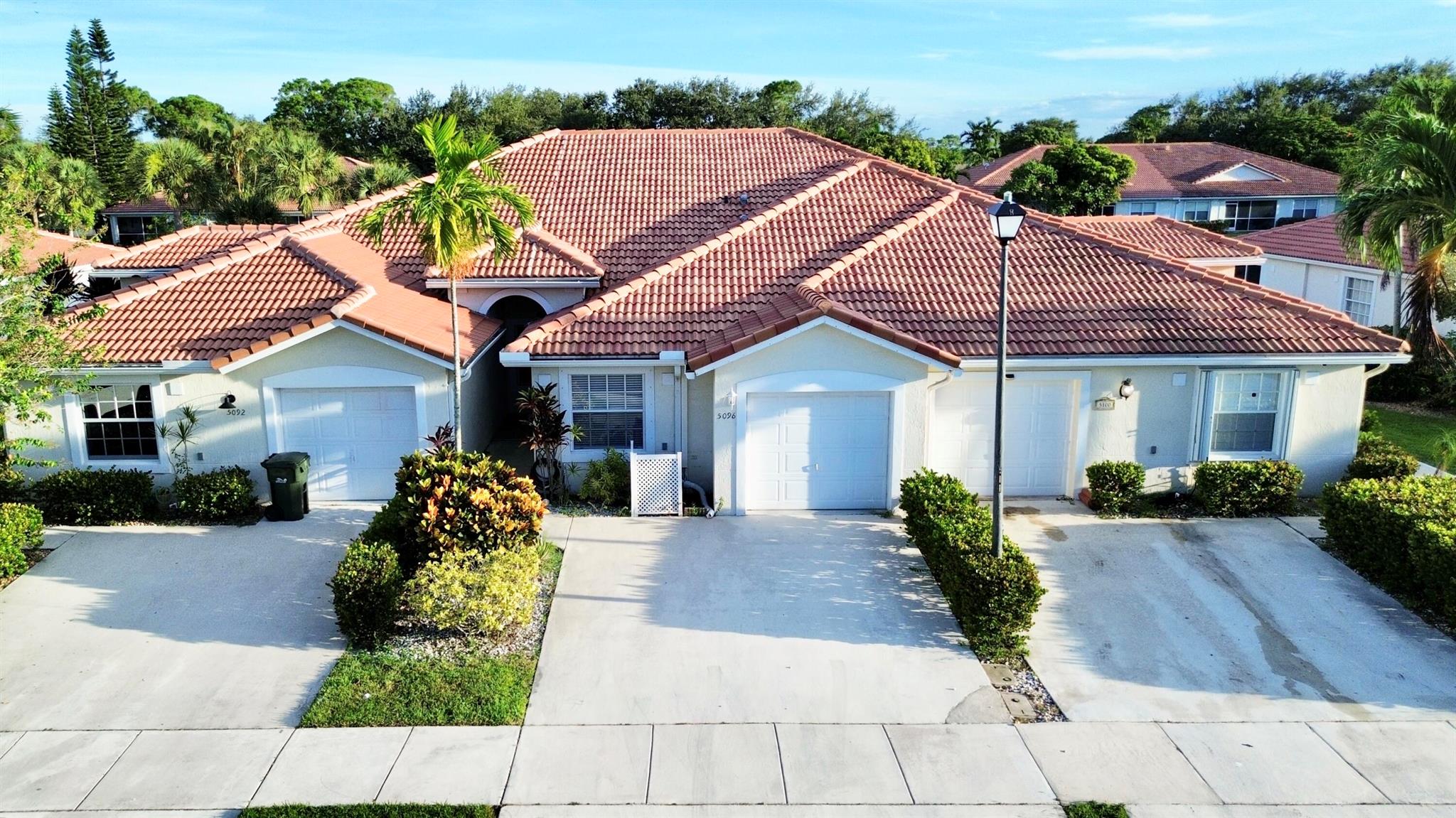 Welcome to this beautiful 2-bedroom, 2-bath villa with a one-car garage, nestled in a serene, pet-friendly, all-ages community. Step inside and be greeted by soaring ceilings that create a spacious and stylish ambiance. The home features an eat-in kitchen, stainless steel appliances, and a bonus space perfect for a dining room, den, or library. The primary suite offers comfort with a full walk-in closet, while the screened-in porch overlooking the lake provides the perfect setting for outdoor living and relaxation. Residents get access to a clubhouse, pool, and tennis court--all just steps from your front door. Low HOA of $360/month covering high-speed internet, Hotwire TV, landscaping, pool, clubhouse, and tennis court, you'll enjoy worry-free living. Best of all, NO membership required.