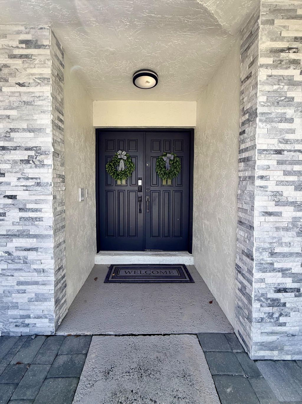 Photo of 325 Knotty Wood Lane, Wellington, FL 33414 (MLS # R11159584)