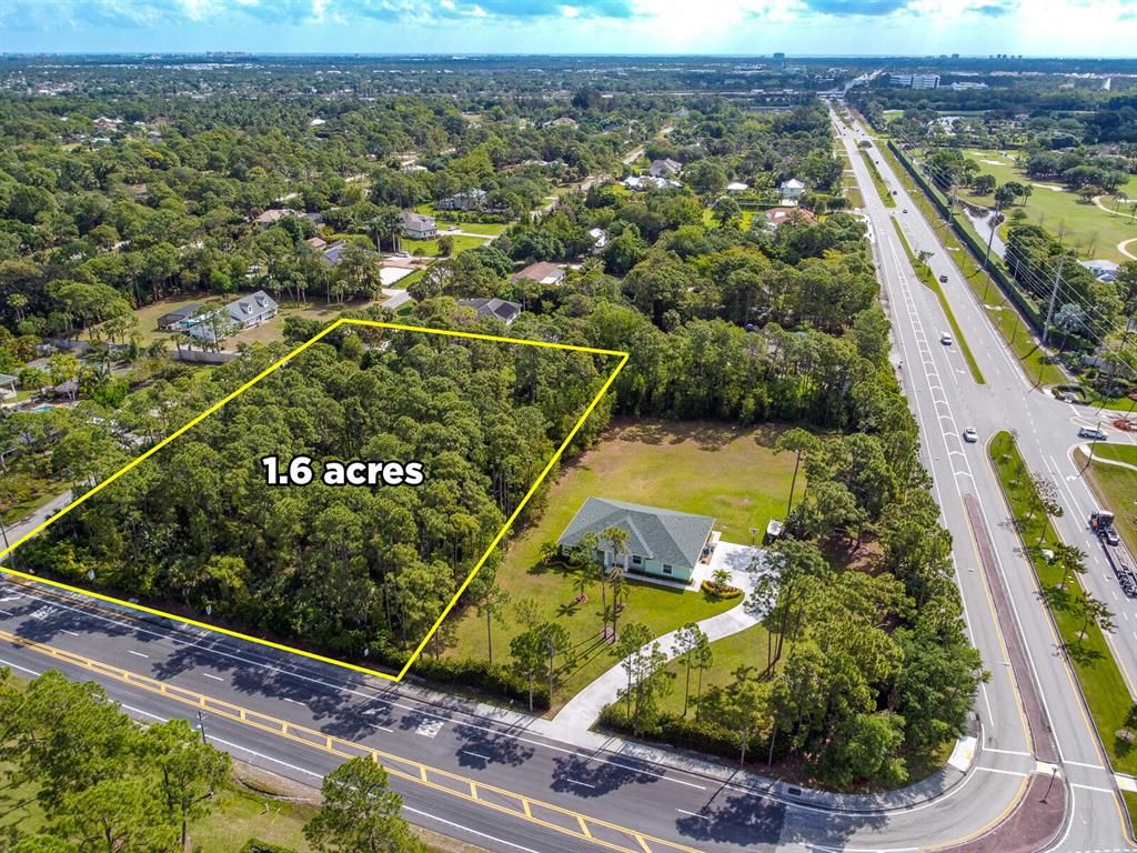 Photo of 233 69th Drive N, Palm Beach Gardens, FL 33418 (MLS # R10731344)