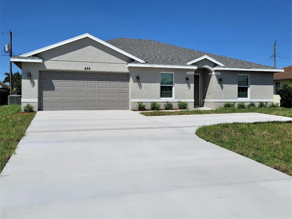 Photo of 459 SW Paar Drive, Port Saint Lucie, FL 34953 (MLS # R10955829)