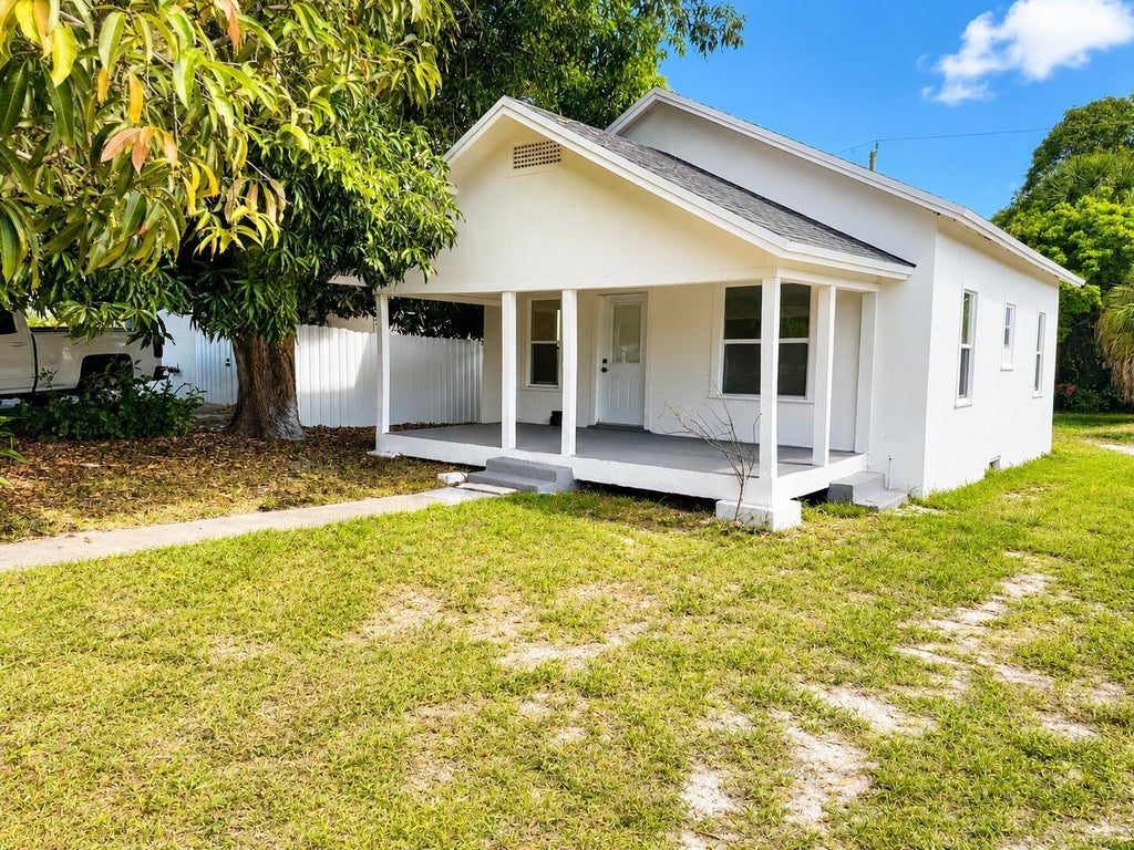 Photo of 719 Tuscaloosa Street, West Palm Beach, FL 33405 (MLS # B26048665)