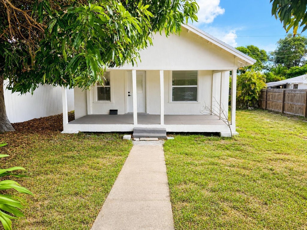 Photo of 719 Tuscaloosa Street, West Palm Beach, FL 33405 (MLS # B26048665)
