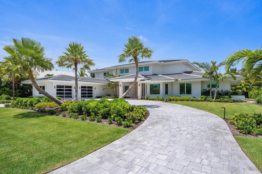 Discover this newly gut-renovated ''California Contemporary'' home sitting on a Jack Nicklaus Signature golf course. Enjoy soaring 20' ceilings in the living room & dining area. Don't forget about the expansive pool deck lanai that features 20' tall, exposed wood ceilings, a fire pit, summer kitchen, large pool & spa. Everything is new from the roof down to the floors, including impact windows & doors & even an air-conditioned oversized garage! The spectacular 532-acre community of Sailfish Point offers the ultimate Florida resort lifestyle w/ a full-service marina, oceanfront country club w/ fine & casual dining. Har-Tru tennis, Jack Nicklaus ''Signature'' golf course, state of the art fitness center & spa, helipad, 1.5 miles of glorious beach + guard gated & patrolled for utmost security