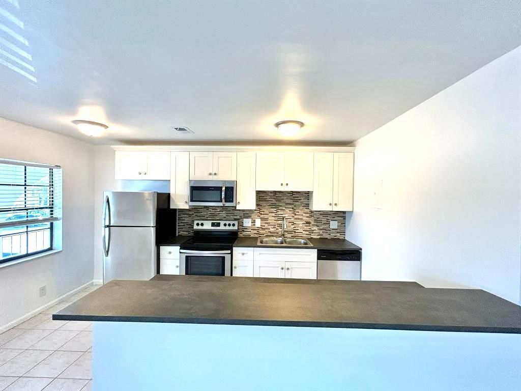 Photo of 1004 Pine Drive #204, Pompano Beach, FL 33060 (MLS # B26025326)