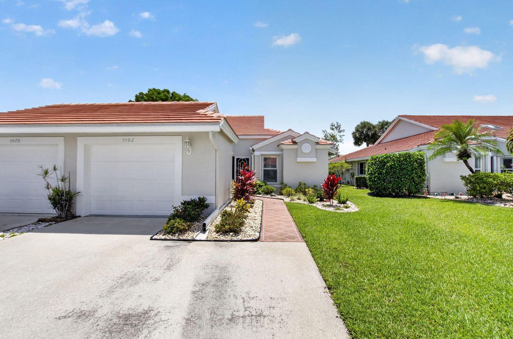 Photo of 5582 Royal Lake Circle, Boynton Beach, FL 33437 (MLS # B26035429)