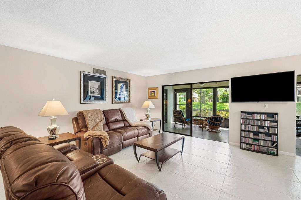Photo of 10576 Tropic Palm Avenue #102, Boynton Beach, FL 33437 (MLS # B26017226)