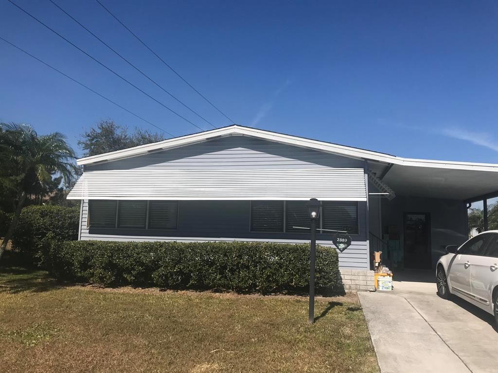 Photo of 2889 SW Pontiac Place, Stuart, FL 34997 (MLS # R10688693)
