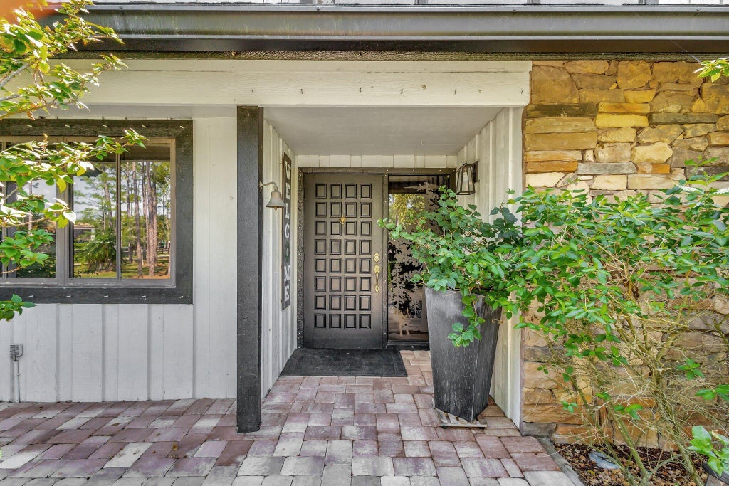 Photo of 5446 Reynolds Road, Lake Worth, FL 33449 (MLS # B26013297)