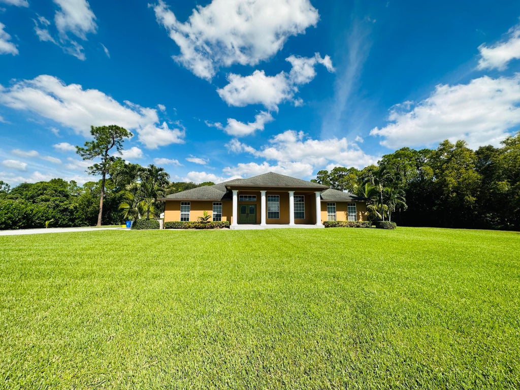 Photo of 14917 TANGELO Boulevard, The Acreage, FL 33412 (MLS # B26073751)