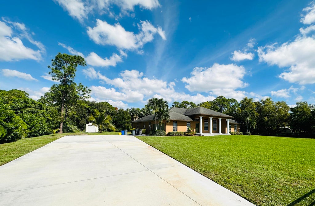 Photo of 14917 TANGELO Boulevard, The Acreage, FL 33412 (MLS # B26073751)