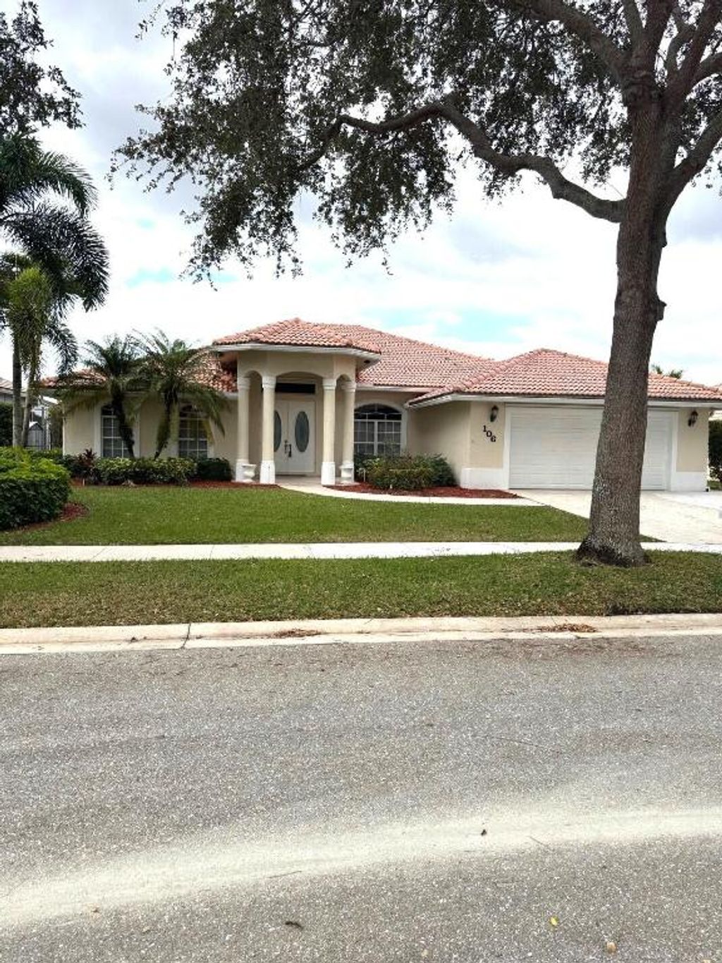 Photo of 106 Pepper Tree Crescent, Royal Palm Beach, FL 33411 (MLS # R11155546)