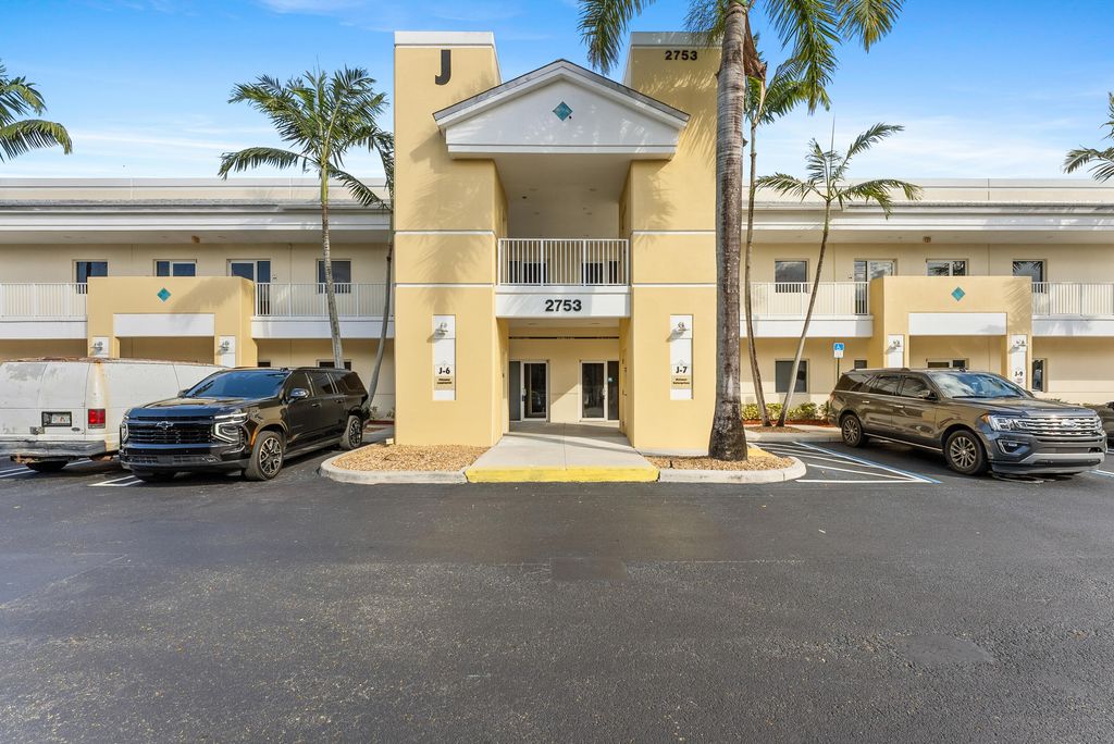 Photo of 2753 Vista Parkway #6, West Palm Beach, FL 33411 (MLS # R11144594)