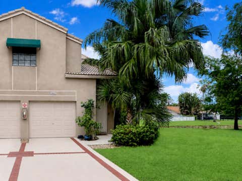 Photo of 1661 Cypress Pointe Drive #5b, Coral Springs, FL 33071 (MLS # B26037564)