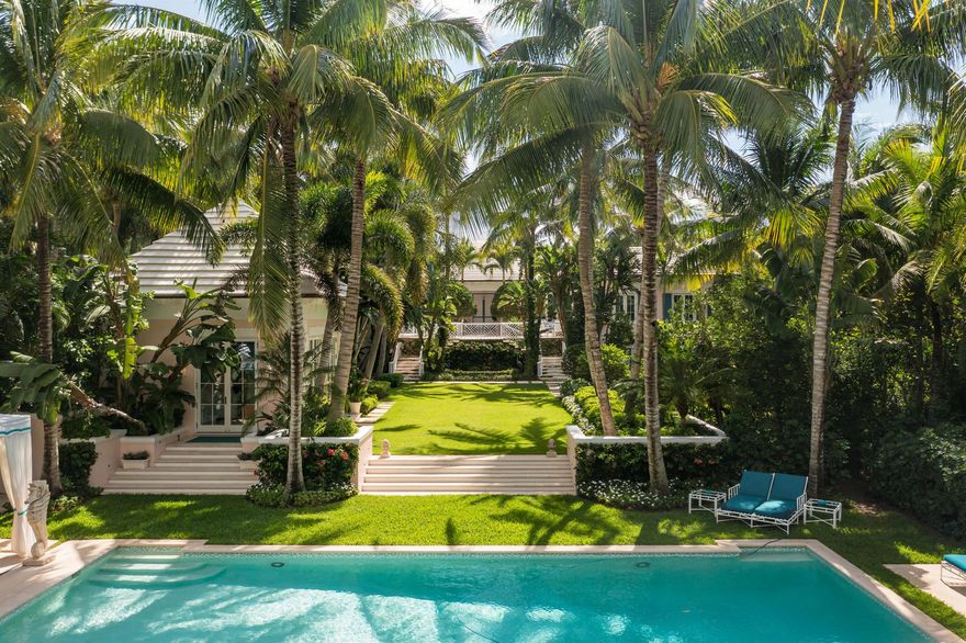 Sitting on 2 acres with a direct oceanfront parcel, 338 S Beach Rd on Jupiter Island is the epitome of old world Florida sophistication and tasteful elegance. Completed in 2012, the three-year renovation was done to highest design/construction standards including lacquered walls, Pecky cypress millwork and Chinese Chippendale railings. Renowned Belgian landscape architect Francois Goffinet created a parterre rose garden and oversaw the installation of verdant gardens throughout plus planting of different species of palms. In addition to the 9 bedrooms in the main house each with ensuite bathroom, there is a separate guest house and immense pool cabana with an outdoor kitchen and two full changing/bathrooms.