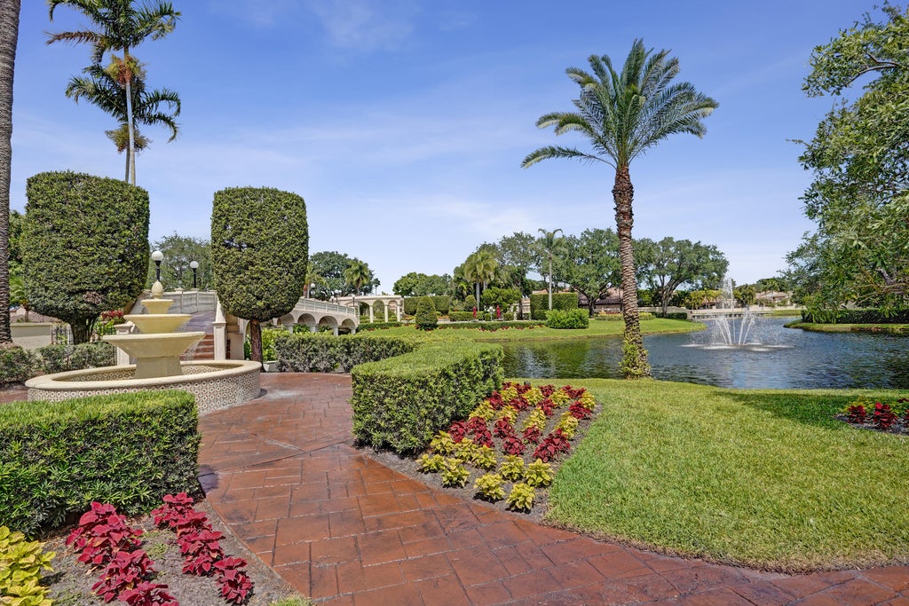 Photo of 706 Deer Creek Via Genova, Deerfield Beach, FL 33442 (MLS # B26040974)