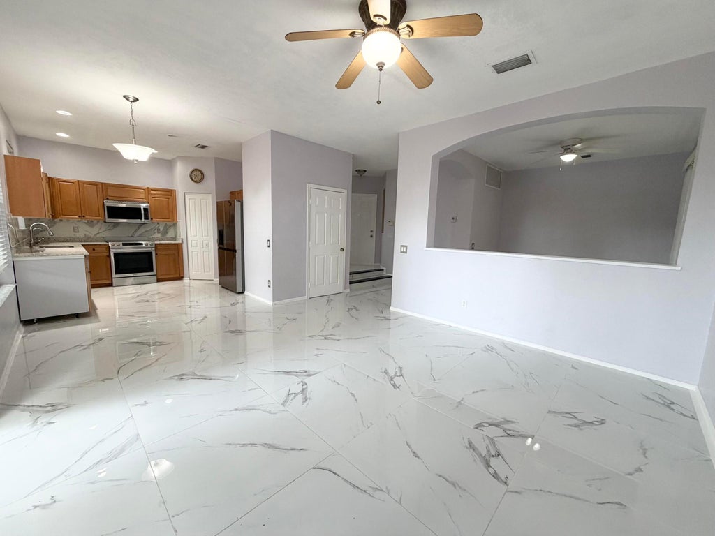 Photo of 5487 Queenship Court, Greenacres, FL 33463 (MLS # B26040621)