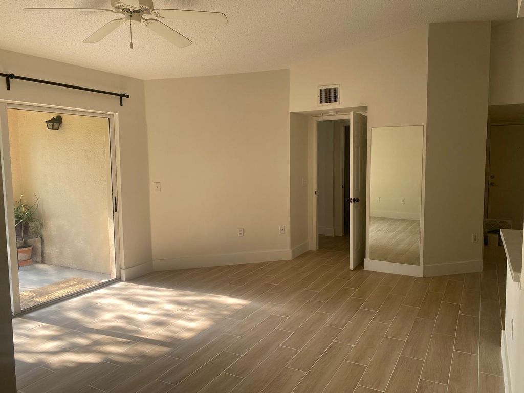 Photo of 2457 Centergate Dr #302, Miramar, FL 33025 (MLS # F10540960)