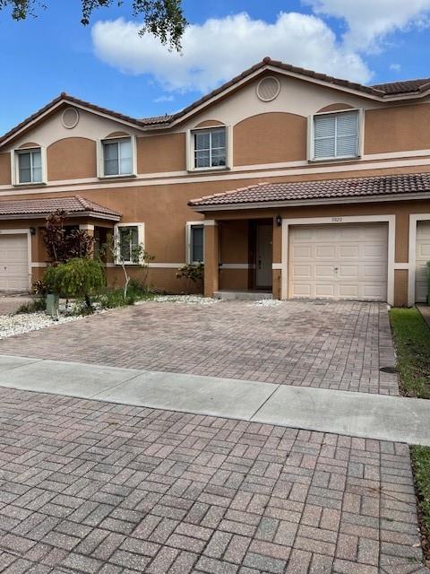 Spacious 3/2.5 bath townhouse with 1-car garage in sought after residential community of Sunset Plaza. Over 1,700 sq. ft. of space featuring tile downstairs. Large kitchen with breakfast area looking out to dining area and living room. You will find new vinyl flooring on staircase and 2nd floor. Huge master bedroom with cathedral ceilings, massive walk-in closet and newly updated bathroom. Good size guest bedrooms and bathroom. Accordian shutters. Large fenced yard on water for plenty of play area for the whole family. Enjoy the summer months in South Florida by cooling off in the beautiful community pool. This townhouse is perfectly located in Central Sunrise near 1-75 & 595. You can find great restaurants, and amazing shopping close by at the Sawgrass Mills Mall.