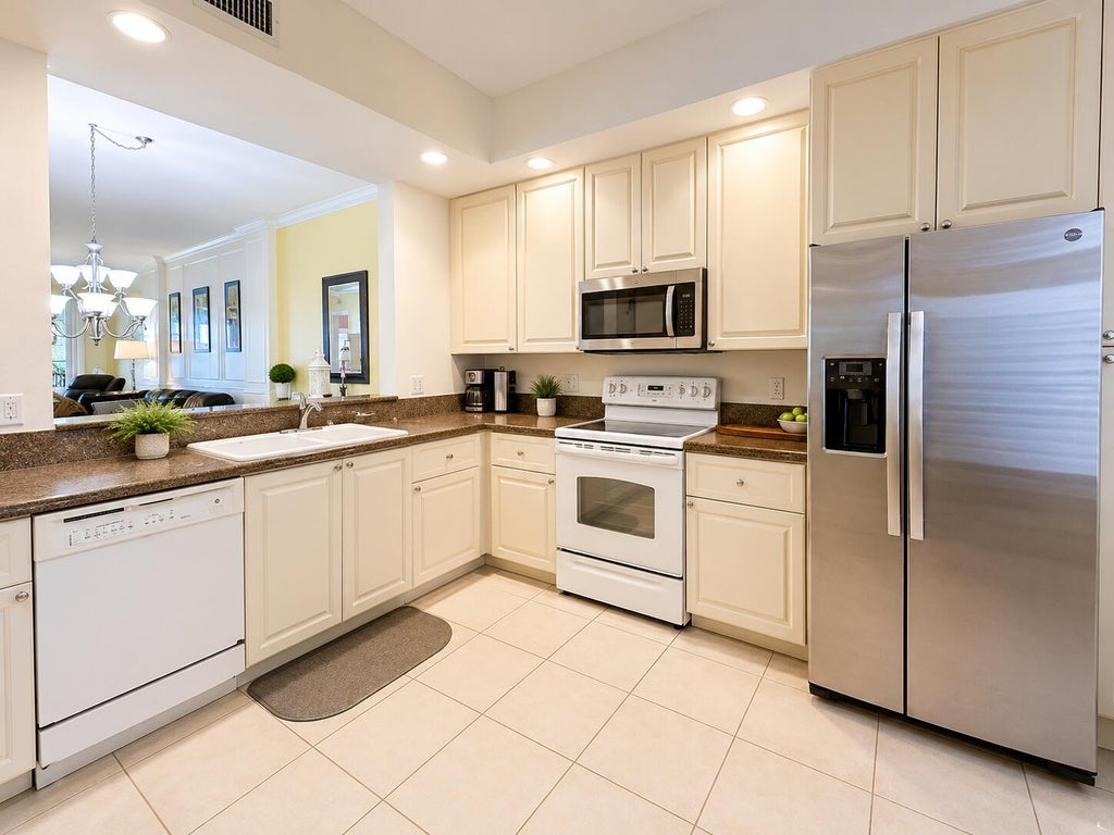 Photo of 13 W Harbour Isle Dr Drive W #101, Fort Pierce, FL 34949 (MLS # B26039451)