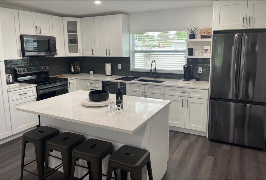 Photo of 1523 Berkshire Avenue, Jupiter, FL 33469 (MLS # B26007764)