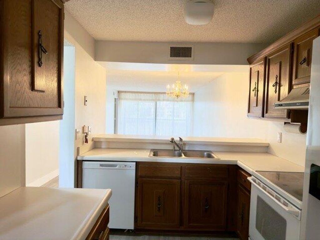 Photo of 6021 Coral Lake Drive #209, Margate, FL 33063 (MLS # B26028263)