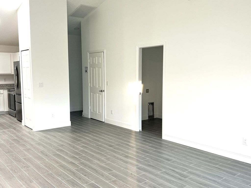 Photo of 5793 NW Coosa Drive, Port Saint Lucie, FL 34986 (MLS # R10956953)