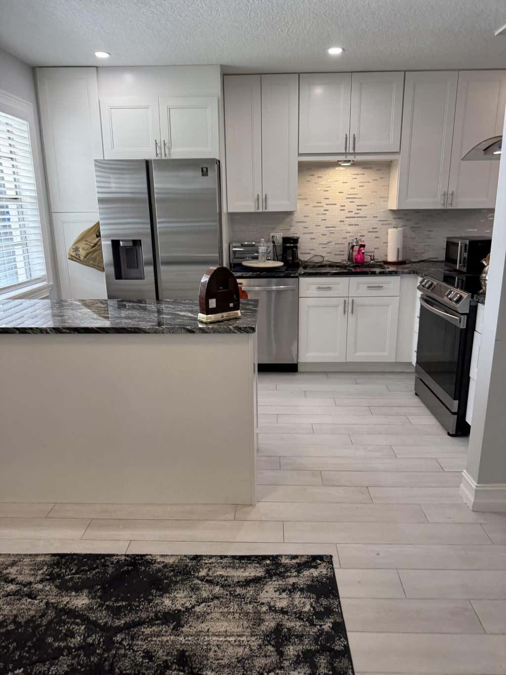 Photo of 133 Lake Olive Drive, West Palm Beach, FL 33411 (MLS # B26061534)