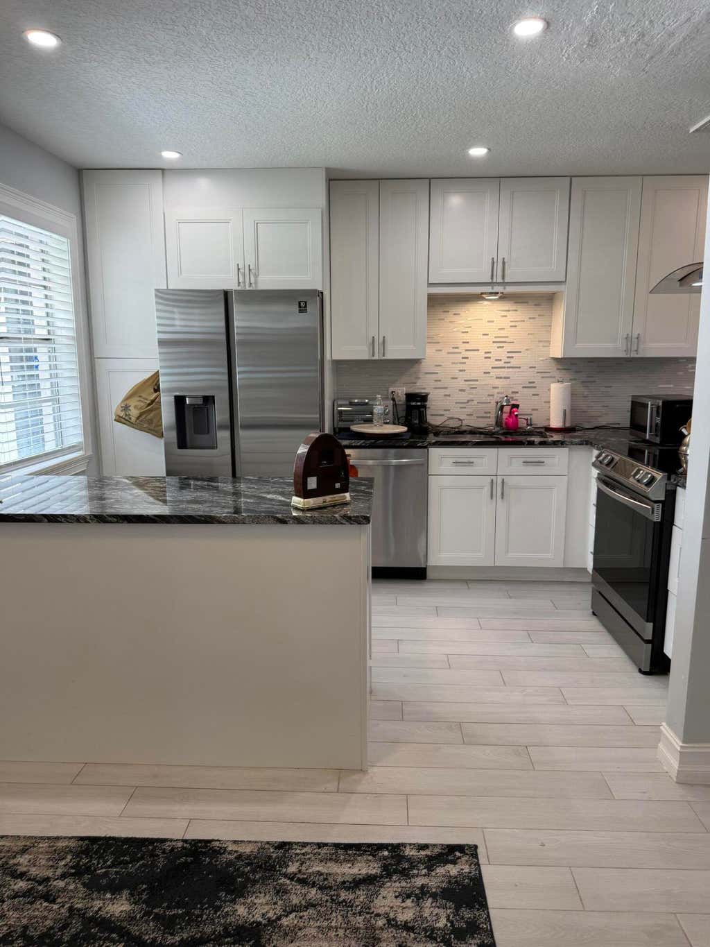 Photo of 133 Lake Olive Drive, West Palm Beach, FL 33411 (MLS # B26061534)