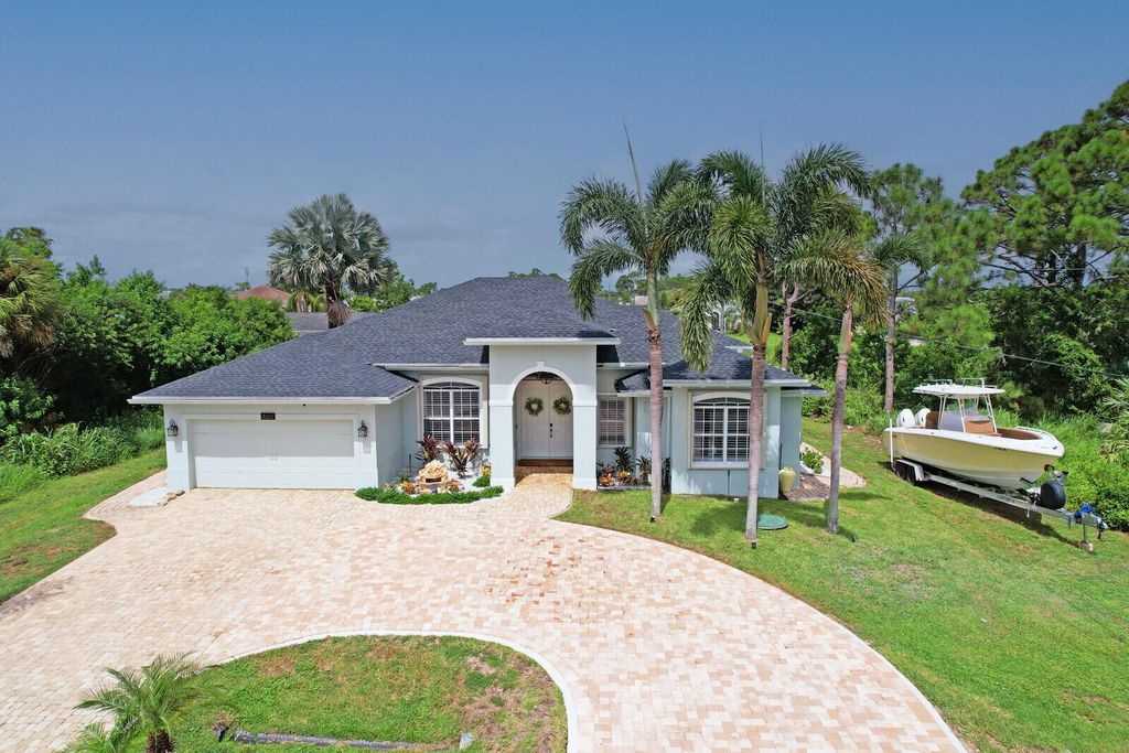 Photo of 4613 SW Galaxie Street, Port Saint Lucie, FL 34953 (MLS # R11010844)