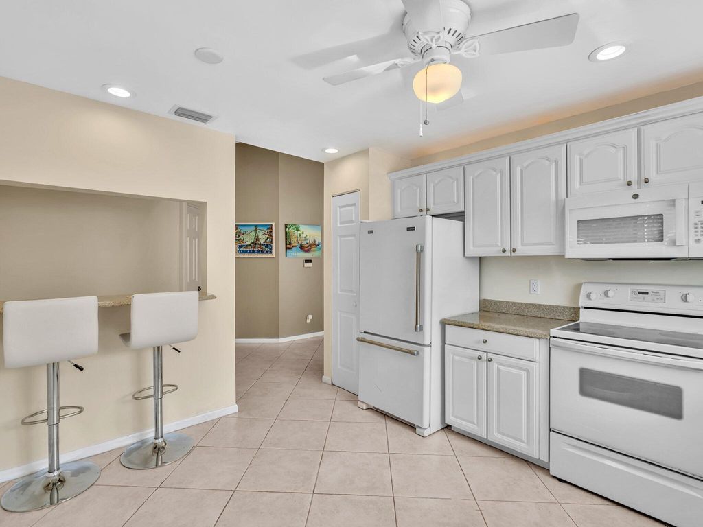 Photo of 5680 Coach House Circle #D, Boca Raton, FL 33486 (MLS # R11091733)