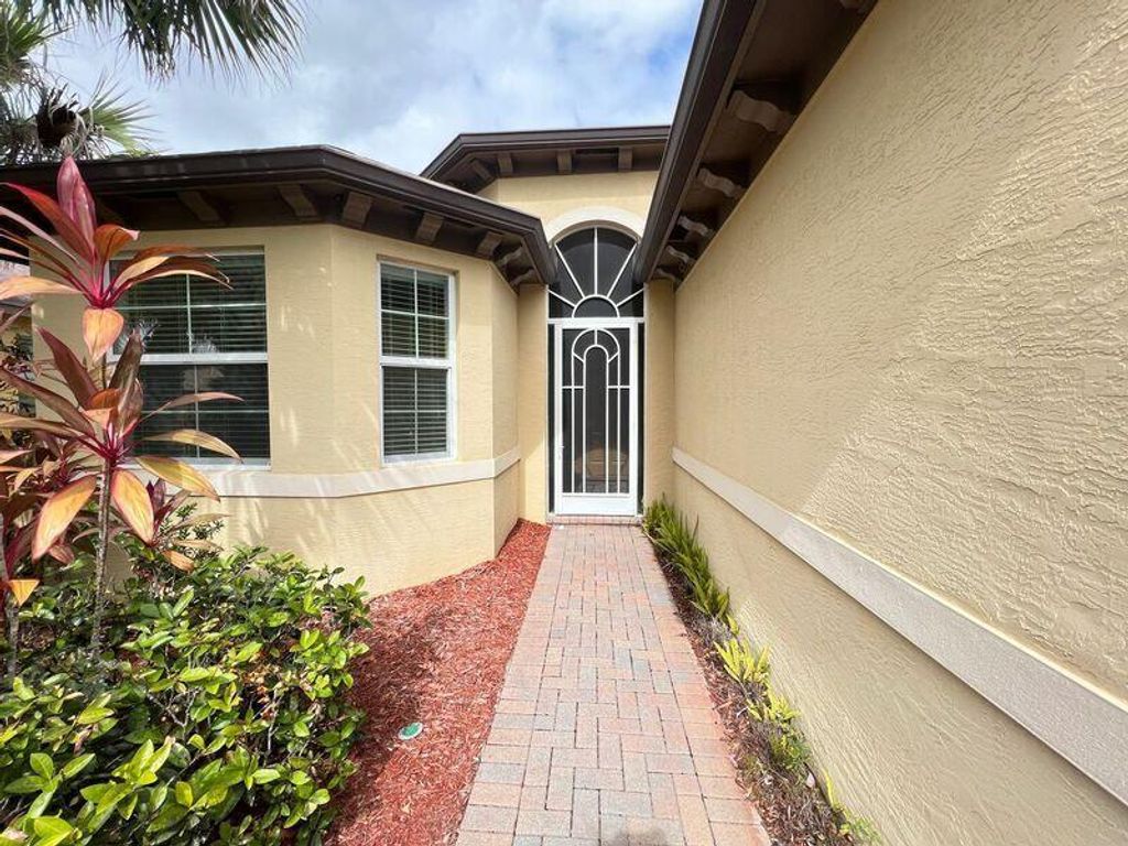 Photo of 11948 SW Crestwood Circle, Port Saint Lucie, FL 34987 (MLS # R11074539)