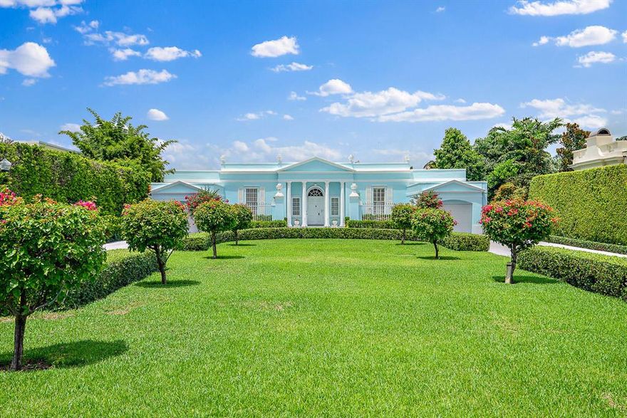 Iconic Lakefront Clarence Mack 1959 Palm Beach Regency. A-list private Estate Section by Mar-a-Lago Club, Bath & Tennis Club, beach and ''Billionaire's Row.'' FEATURES: Privacy and a waterway bird sanctuary setting, dock possible, gracious pool, covered patio & staff quarters. Foyer & rotunda with marble flooring, 12-ft. ceilings, large windows, symmetry, columns, stucco facades, slim lines, uncluttered, pediments, porticos, arches, Wainscoting, detailed millwork, wood floors, marble-mantled fireplace and classical moldings. Spaciously proportioned rooms. The home is the crown-jewel anchor of the Regents Park Historic District cul-de-sac neighborhood of five estate homes. Classic stately Clarence Mack design of simplified elegance! Owner says--''BRING DESIGNER & CHECKBOOK, WRITEUP OFFER!''