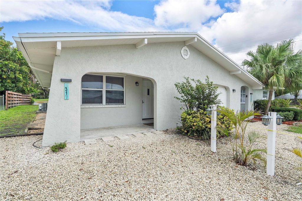 Photo of 3317 NE Jeannette Drive, Jensen Beach, FL 34957 (MLS # F10508187)