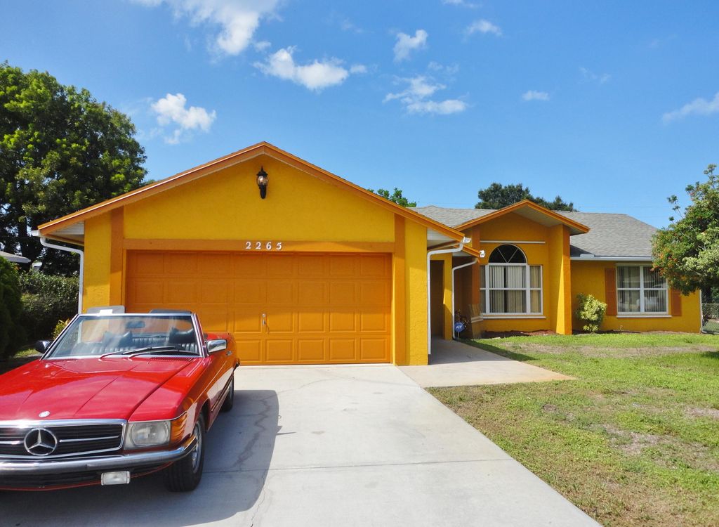 Photo of 2265 SE Carnation Road, Port Saint Lucie, FL 34952 (MLS # R10631211)
