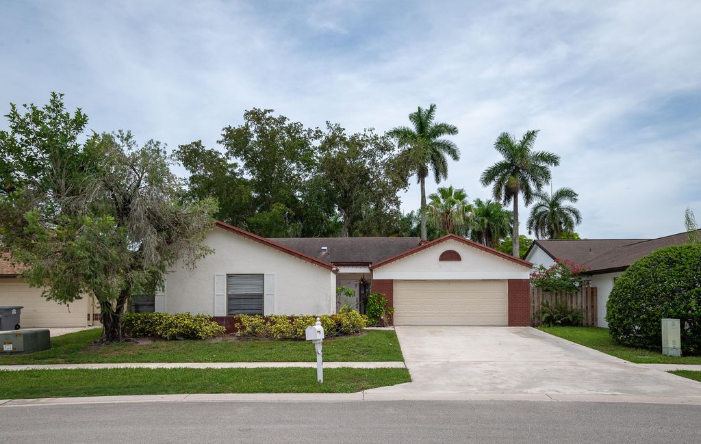 Photo of 11690 Timberwood Road, Boca Raton, FL 33428 (MLS # B26042657)